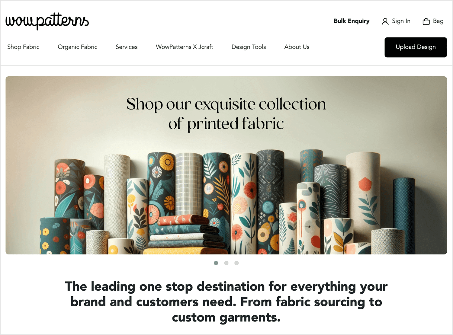 A collection of colorful printed fabric rolls displayed on a shelf at Wowpatterns website